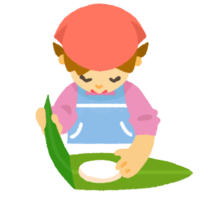 ムーチー（鬼餅）を作る女の子